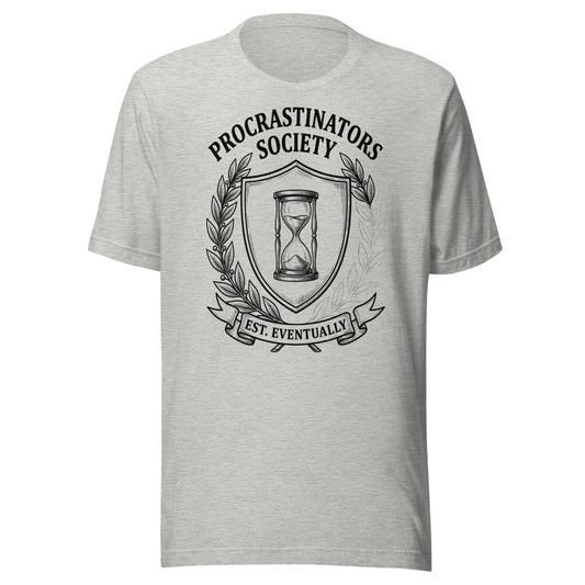 Procrastinators Society — Est. Eventually | Crest Tee Athletic Heather flat lay